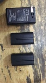 2 BATTERY AND BATTERY CHARGER - Image 2