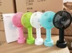MINI  RECHARGEABLE HAND FAN WITH STAND(This is the quality one that comes with good battery,blows well and durable)