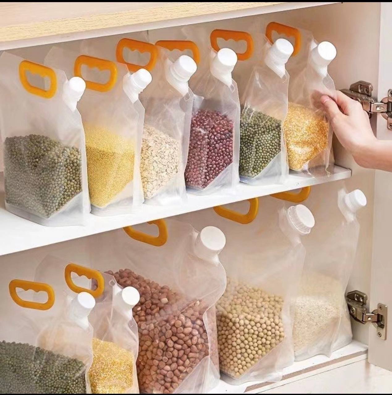 img_2057 STRONG TRANSPARENT SUNCTION NOZZLE BAG(REUSABLE)For storing foodstuff,Snacks,Oils,drinks e.t.c - Image 1