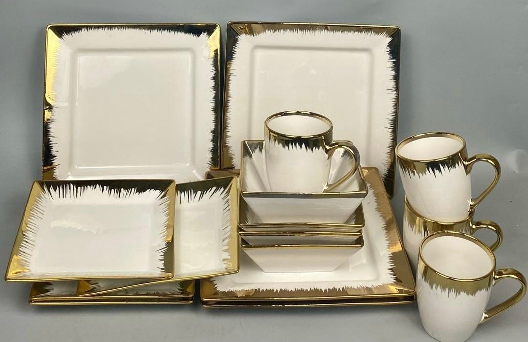 5c4616bf-b4a0-42e6-a642-d788b1281452-2 16PC HIGH QUAL GOLD/WHITE EUROPEAN LUXURY CERAMIC STONEWARE DINNER SET(BOX SHAPE)4 Serving plate
4 Side plate
4 Soup bowls
4 Cups - Image 1