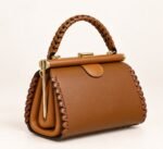 ELEGANT LUXURY TWIST HANDLE GOLD FRAME LEATHER HANDBAG CODE 5801 - Image 3